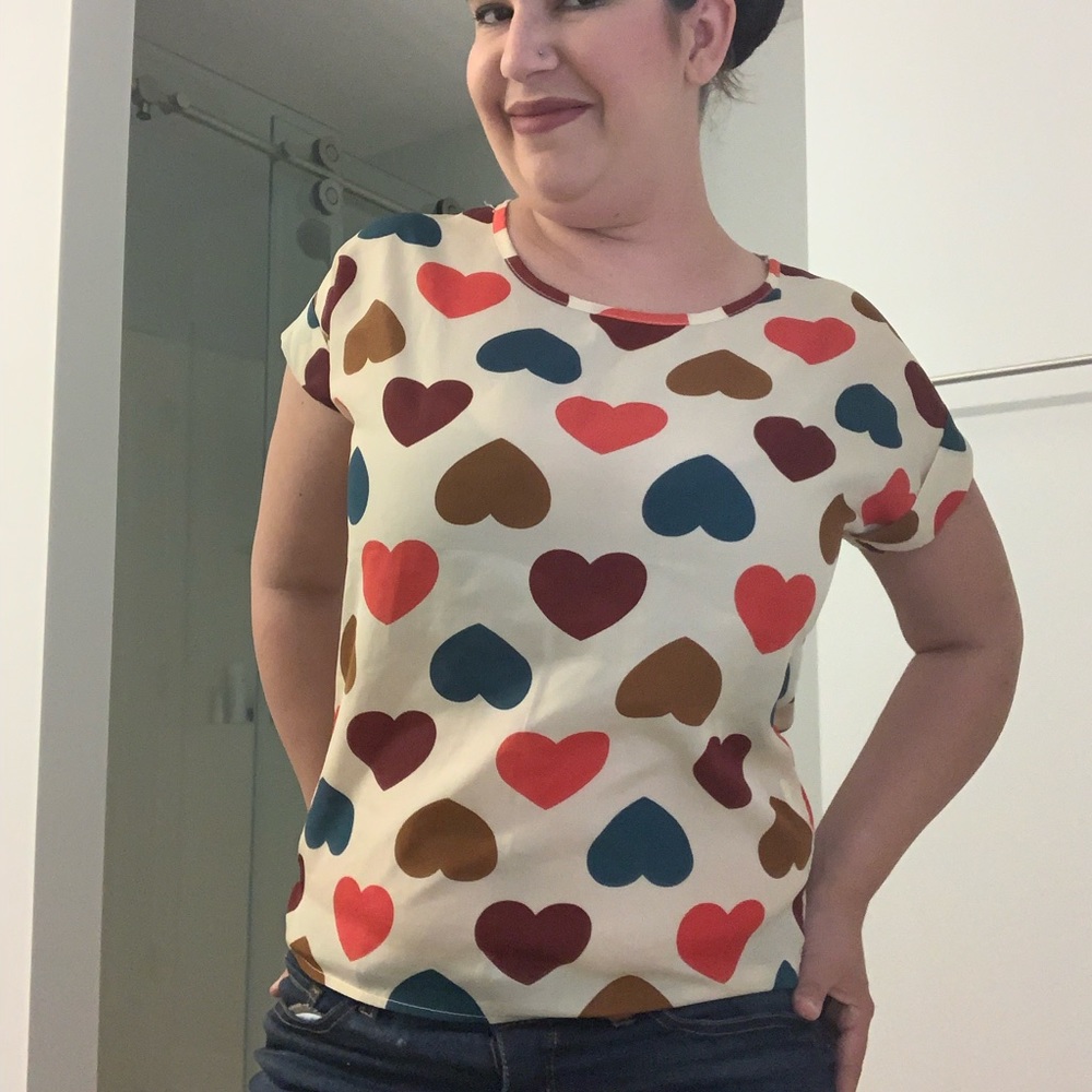Liva Girl size small multi colored heart blouse